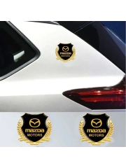 Металлическая эмблема на автомобиль  "MAZDA" самоклеящаяся